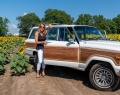 Jo-Ann Folino with her classic 1989 Jeep Grand Wagoneer, courtesy of our hosts from AutoOne | Photo By Emad Mohammadi