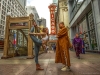 Cassandra Justine (left) and a passing monk, Chicago  | Photo by Robert Sturman