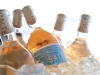 Co-founder Ashley Wade designed the label of SALT vine Wines. Each Cabernet Sauvignon label is made from oxidized copper and handcrafted to perfection. Pictured here is the Rosé