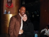 Ashley Walker and fiancé Rafer Alston stand in loving embrace.