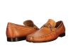 Quintessential footwear for the well-heeled man, tan-coloured Dacaio slip-on loafers by Donald J. Pliner are perfect for day or night.