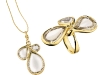 Jewelry house H. Stern reconnects with American fashion designer Diane von Furstenberg to produce a graceful line of chic jewelry. Shining gold bands clasp water-drop shaped jewels, providing complementing centrepieces for elegant evening wear.