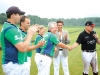 Eduardo L. Bérèterbide and Justin R.G. Fogarty congratulate polo players for their grand efforts.