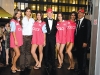 Beautiful models surround Martin Jauregui, Fernando Massalin Sr. and Kevin Brown.