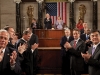 Members of Congress, the Cabinet, and Supreme Court applaud as President Barack Obama enters the House Chamber to deliver his State of the Union address to a joint session of Congress, Jan. 27, 2010.