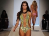 Flirty and feminine, this sunny cut-out swimsuit captures the mood of a day on the beach. Match it with a tweed bag and oversized sunglasses, and you’re set for some fun in the sun. www.lulifama.com