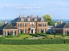 The main lot includes 86 acres of manicured land, formal gardens, fountains, an outdoor pool and ponds