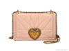 DEVOTION MEDIUM QUILTED CROSS-BODY BAG: This small and chic clutch is made with quilted leather and features a golden heart-embellished flap closure. Made in Italy.