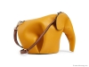 MINI ELEPHANT LEATHER BAG: Made in Spain, this mini leather crossbody bag, in the shape of an elephant, comes complete with a trunk, ears and dot-perforated eyes. And it has a removable, adjustable shoulder strap.