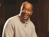 Businessman Michael Lee-Chin smiles broadly in his Portland Holdings Inc. boardroom. Photo by Dean West