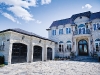 Custom homes like this colossal castle are a company specialty, resembling timeless designs both inside and out – just like Versaille’s extravagant Les Grands appartments.