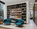 A built-in library highlights this comfortable and cozy lounge space abutting the music room | Photo By Kris Tamburello Studios