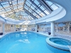 the balding estate skylit poolhouse