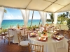 the pelican grand hosts a number of banquets and destination weddings mere steps from the beach