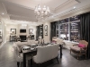 Living and dining room  of the Elegant Suite,  which features two bedrooms  and northwest views of  the city skyline