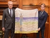 David Dixon and Dr. John Semple show off the gorgeous piece of artwork that is their silk scarf collaboration