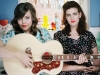 Gracing the stage in 1950s vintage dresses and voices to match, Laura and Lydia Rogers hail from Muscle Shoals, Alabama.