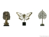 From top to bottom: Woman, 2014, bronze, 31x17x10 inches; Butterfl y, 2015, bronze and mixed media, 34x34x6 inches; Tree, 2014, bronze, 38x21x10 inches