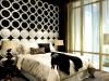 The geometric shapes in the South Beach Collins Model Suite bedroom are a treat for the senses.
