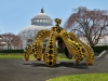 On the lawn rests the monumental Dancing Pumpkin, a 4.9-metre-high bronze sculpture painted in black and yellow | Photo Courtesy Of Yayoi Kusama